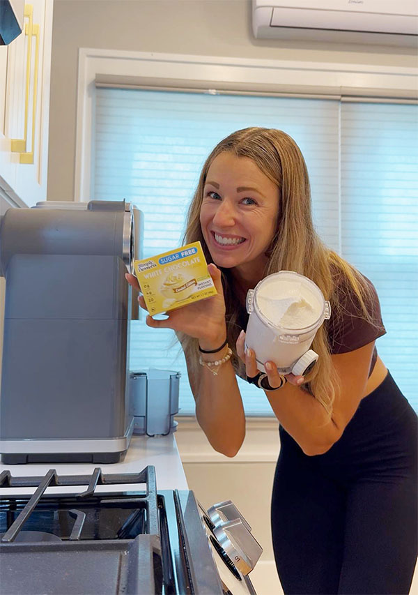 White Choc Protein Soft Serve Wrap with @iamjosefineholmberg holding ninja creami pint with simply desserts white chocolate pudding