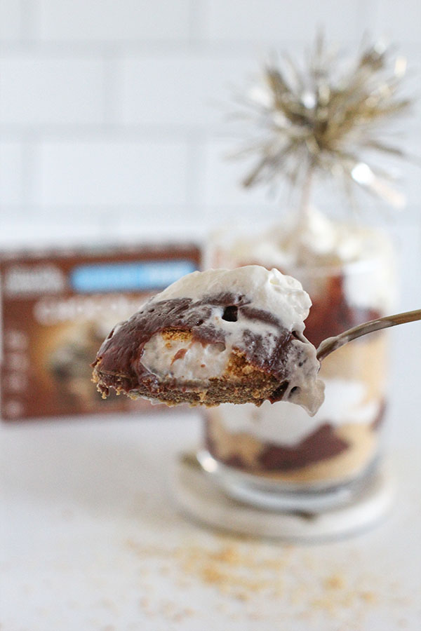 spoonful of sugar free chocolate pudding parfait with creamy whipped topping